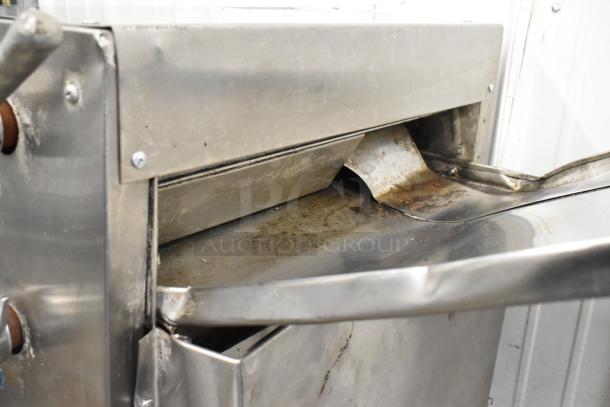 Bakri Co Metal Commercial Floor Style Dough Sheeter, 250 Volts, showing used condition with visible surface rust and wear.