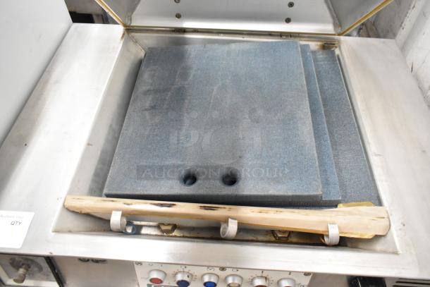 Multivac A300/22 metal commercial vacuum sealer, countertop model. Includes control panel, 220V, 1 phase. Used condition.