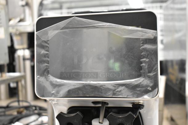 BRAND NEW Vevor BQL-9200ST stainless steel soft serve ice cream machine. Scratch and dent, still sealed with protective film. 110V.