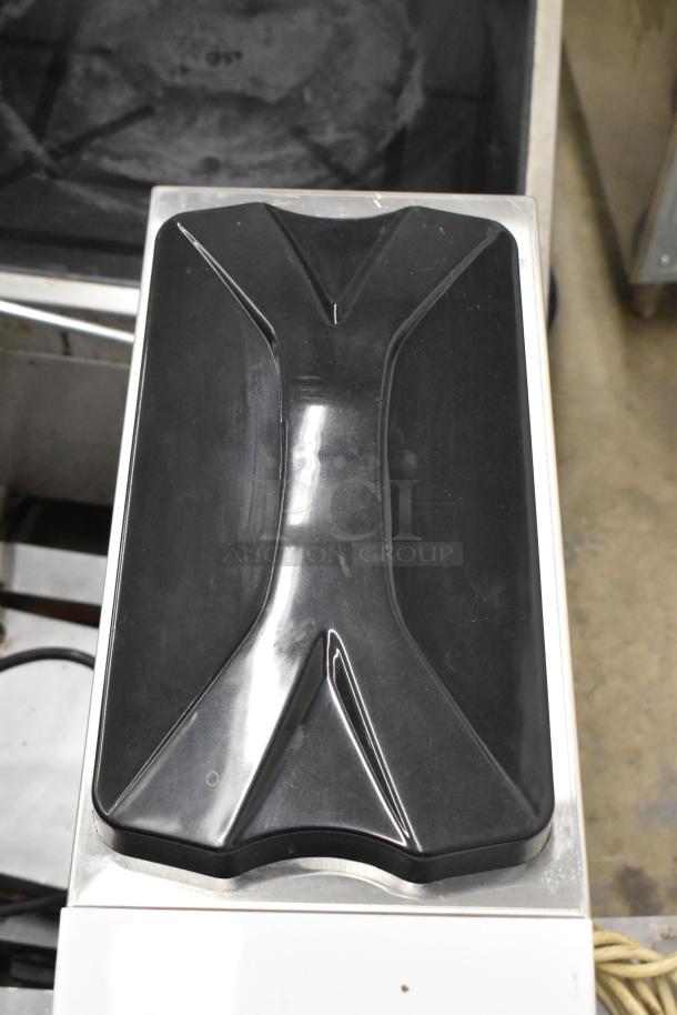 Brand new Vevor BQL-9200ST stainless steel soft serve ice cream machine. Scratches visible on the top, plug included.