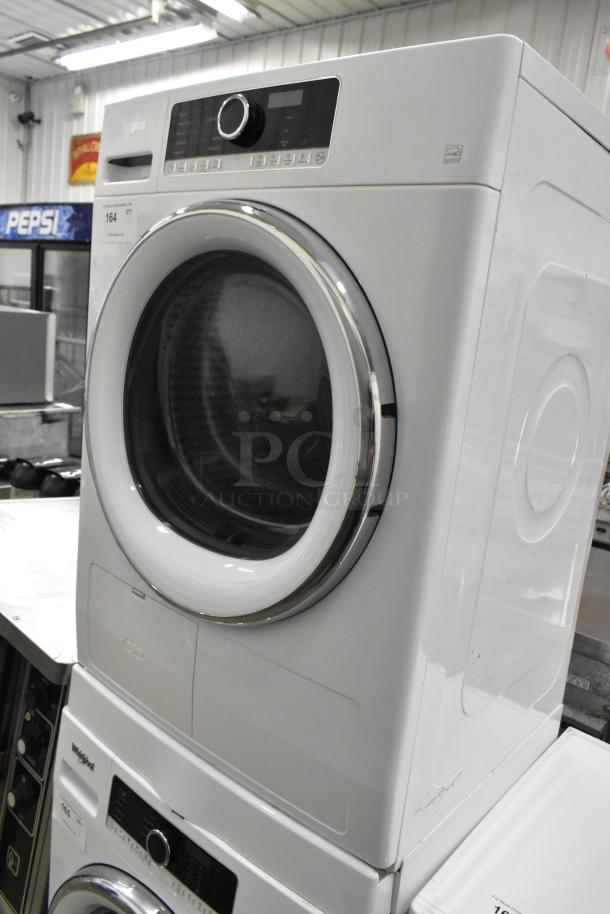 Whirlpool front load dryer, metal, 120 volts, 1 phase, white finish, digital controls, excellent condition.