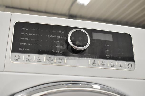 Whirlpool front load dryer, metal finish, control panel with multiple settings, 120V, 1 phase.