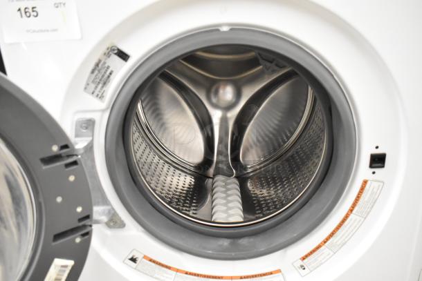 Whirlpool WFW5090JW 0 front load dryer, metal finish, interior drum view, 120 volts, 1 phase, new condition.