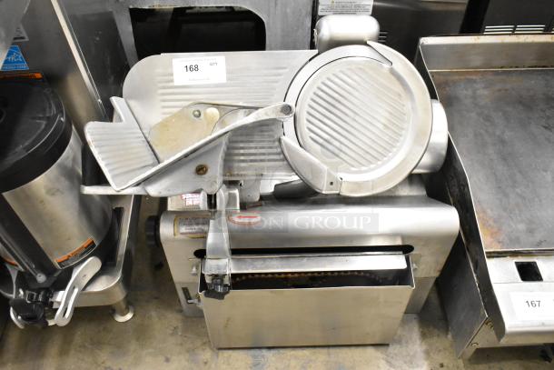 Globe 775 stainless steel commercial meat slicer with blade sharpener, 115 volts, 1 phase, automatic, countertop model.