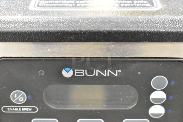 Bunn ICB SH stainless steel commercial coffee machine, featuring hot water dispenser and digital controls, in good condition.