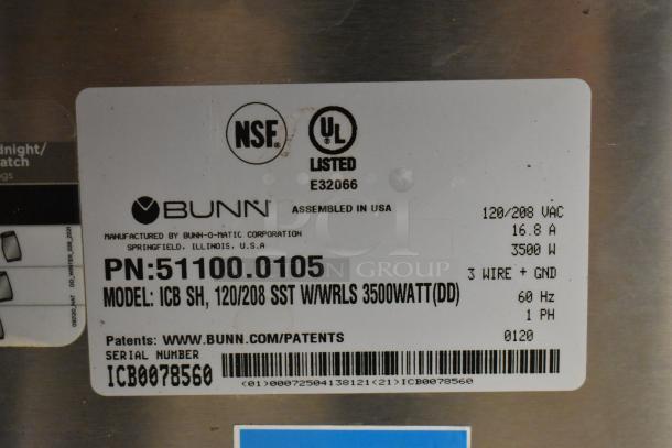 Bunn ICB SH commercial coffee machine, stainless steel, 120/208V, with tags showing model, serial number, and certifications.
