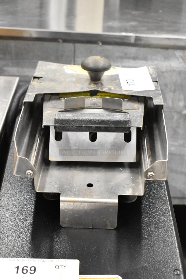 Prince Castle Stainless Steel Bagel Saber, used condition, sturdy metal construction, visible auction tags, slicing mechanism shown.