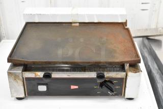 Cecilware ELG-1F stainless steel electric griddle, 120 volts, 1 phase, rusted top, dials for heat control, visible wear.