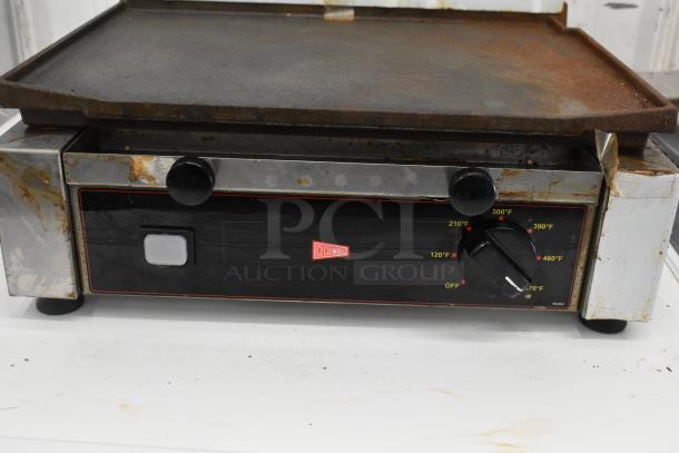 Cecilware ELG-1F stainless steel commercial countertop electric griddle, 120V, with visible wear and adjustable temperature dial.