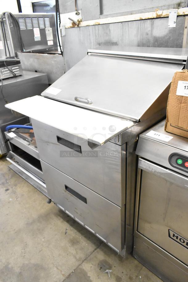 Delfield stainless steel commercial sandwich salad prep table with two drawers, mega top, bain marie, on casters. 115V, 1 phase.