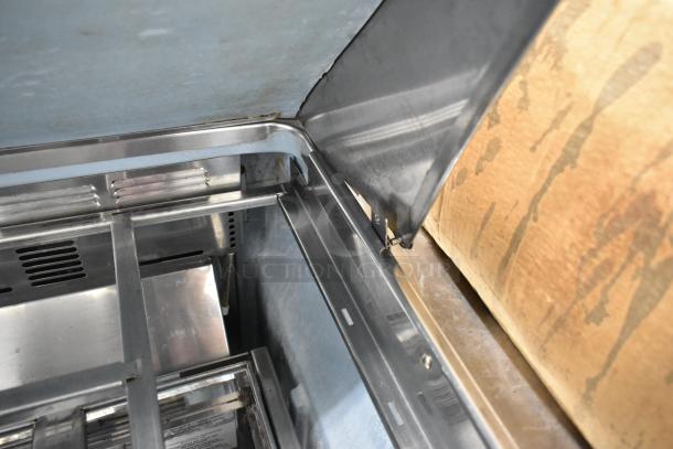 Delfield stainless steel sandwich salad prep table, Mega Top, 2 drawers, bain marie, on casters, 115 volts, 1 phase.