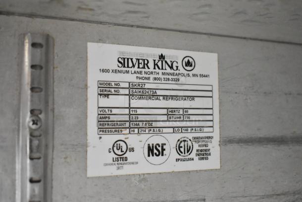 Silver King SKR27 stainless steel undercounter cooler tag, showing model, serial number, voltage, refrigerant, and certifications.