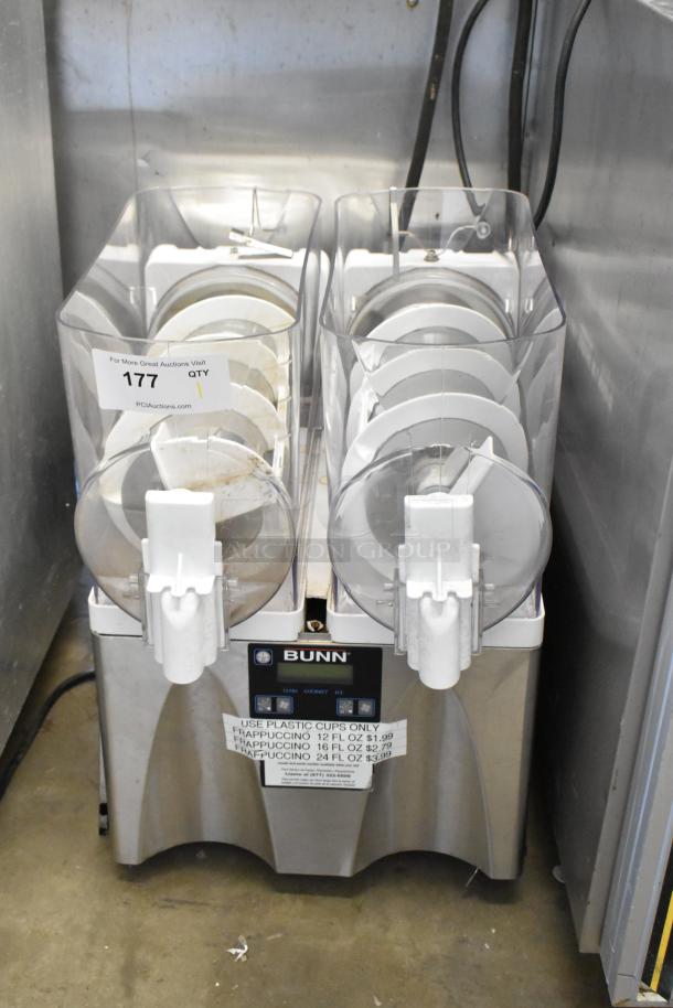 Bunn Stainless Steel Commercial 2 Hopper Slushie Machine, no lids, 115V, 1 phase. Contains user instructions and pricing labels.