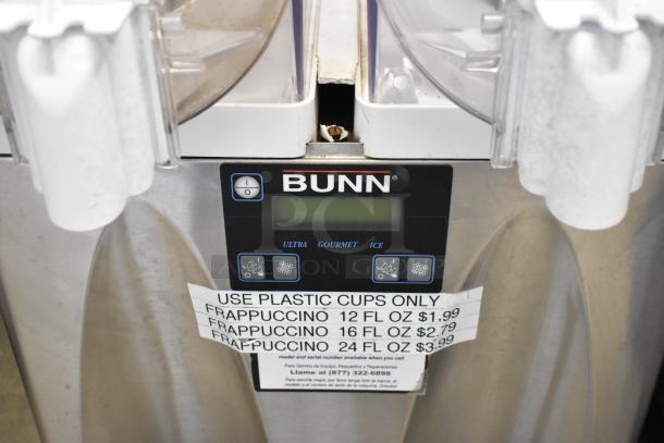 Bunn stainless steel countertop slushie machine with 2 hoppers. No lids. Features digital display and price labels. 115 volts, 1 phase.