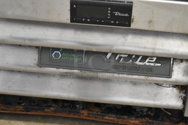 2017 True T-12-HC commercial cooler, stainless steel, single door, 115V, natural refrigerant label visible, used condition.