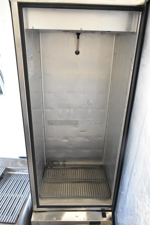 2017 True T-12-HC stainless steel commercial single-door cooler, 115V, 1 phase, interior shelving, good condition.
