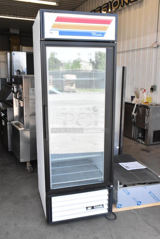 True GDM-23F commercial freezer with glass door, poly-coated racks, and colorful branding. 115V, 1 Phase.