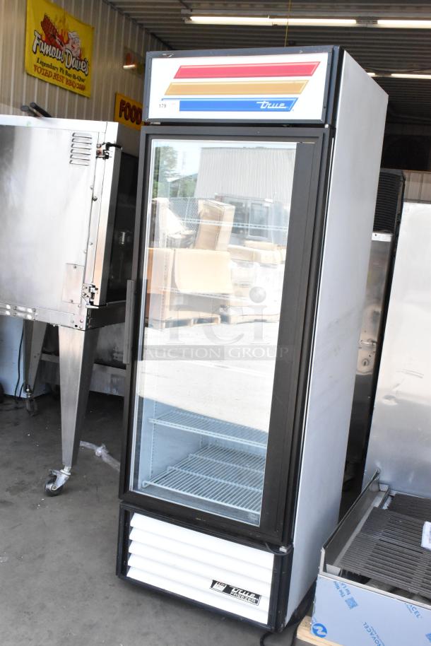 True GDM-23F commercial freezer merchandiser with single glass door, metal frame, poly coated racks, 115V, 1 phase.