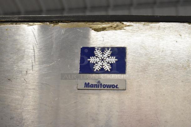Stainless steel Manitowoc SY1405W ice machine head on B970 bin, 208-230V, 1 phase, with visible logo, used condition.