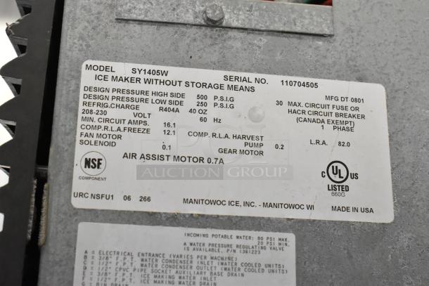 Manitowoc SY1405W ice machine label displaying model, serial no. 110704505, voltage, phase, and specifications.