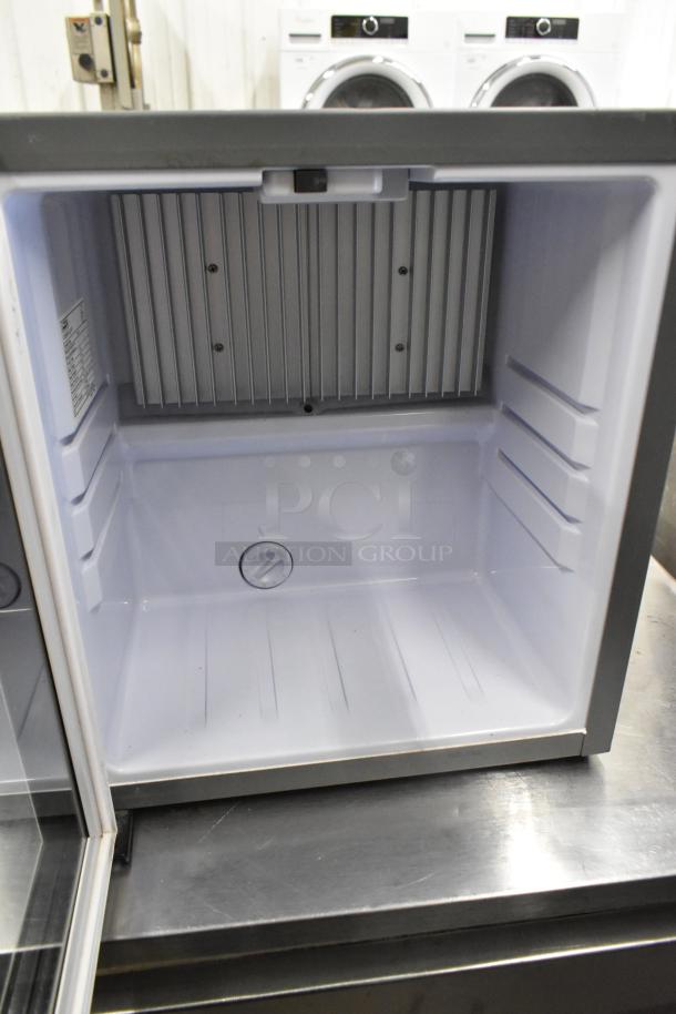 Indel B Iceberg 20 PV Metal Mini Cooler, 115V, 1 Phase, open interior view showing temperature dial and cooling fins.