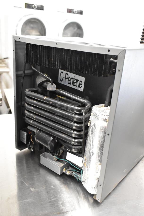 Indel B Iceberg 20 PV Metal Mini Cooler Merchandiser, 115V, 1 Phase. Rear view showing components and C-Pentane label.