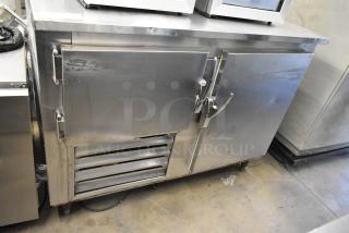 Leader Stainless Steel Commercial 2-Door Undercounter Cooler, 115V, 1 Phase, featuring robust stainless steel, with visible wear.