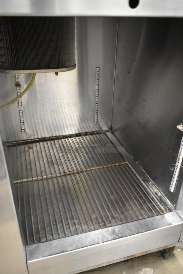 Leader stainless steel 2-door undercounter cooler, commercial use, 115 volts, 1 phase, internal shelving visible, clean condition.
