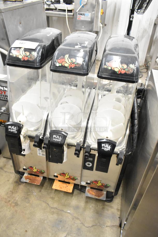 Elmeco FC3 stainless steel countertop slushie machine with 3 hoppers, 115V, 1 phase, fruit decal, pull levers, used condition.