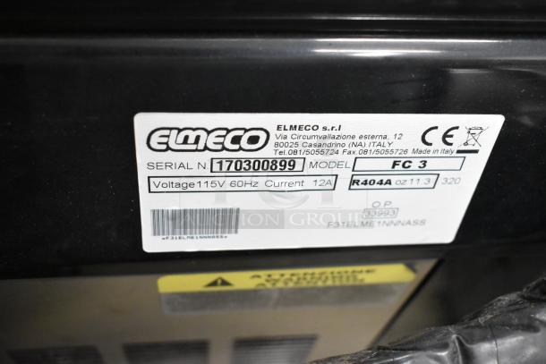 Elmeco FC3 stainless steel slushie machine label showing model, voltage 115V, 1 phase, serial number 170300899.