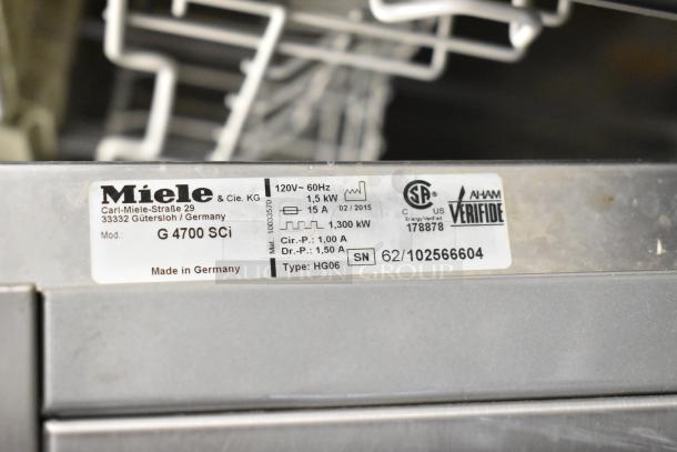 Miele G4700SCi stainless steel undercounter dishwasher, 120V, 1 Phase; label shows model and energy specs, made in Germany.
