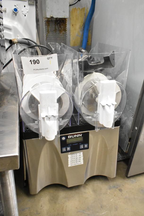 Bunn Stainless Steel 2 Hopper Slushie Machine, no lids, visible hopper damage, 115V, 1 phase, price list attached.