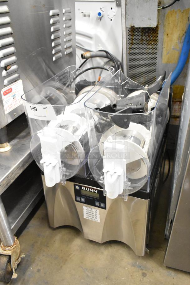 Bunn stainless steel 2-hopper slushie machine, no lids, hopper damage visible, 115 volts, 1 phase, commercial use.