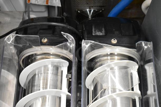 Bunn stainless steel commercial slushie machine, 2 hoppers, visible hopper damage, no lids, 115V, 1 phase.