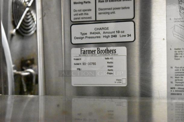 Bunn Stainless Steel 2 Hopper Slushie Machine, no lids, hopper damage visible, 115V, 1 Phase. Labels indicate model and specs.