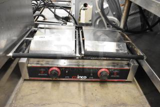 Winco EPG-2 stainless steel double panini press, commercial countertop model, 120 volts, 1 phase, visible wear.