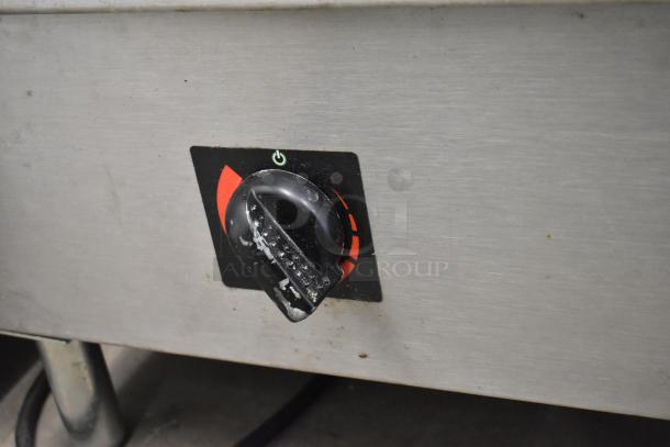2021 CookTek MSP7000-200 stainless steel induction range, showing control knob and worn surface. 208V, 1 phase model.