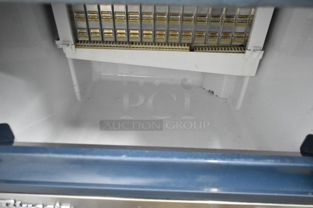 Blue Air BLUI-150A stainless steel ice machine interior, showing ice grid. Model runs on 115 volts, 1 phase.