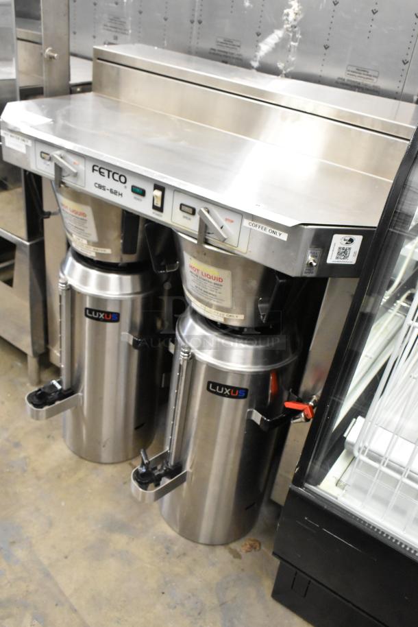 Fetco CBS-62H stainless steel double coffee machine with hot water dispenser, 2 brew baskets, 4 servers, 120/208-240V, 1 phase.