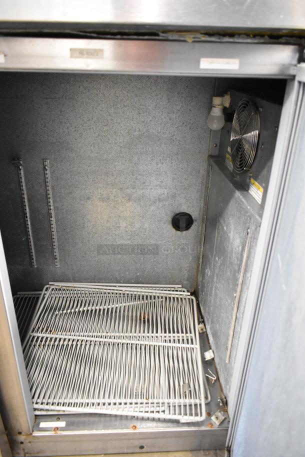 Beverage Air BB72 stainless steel undercounter cooler, 3 doors, 115 volts, 1 phase, interior view, shelving visible.