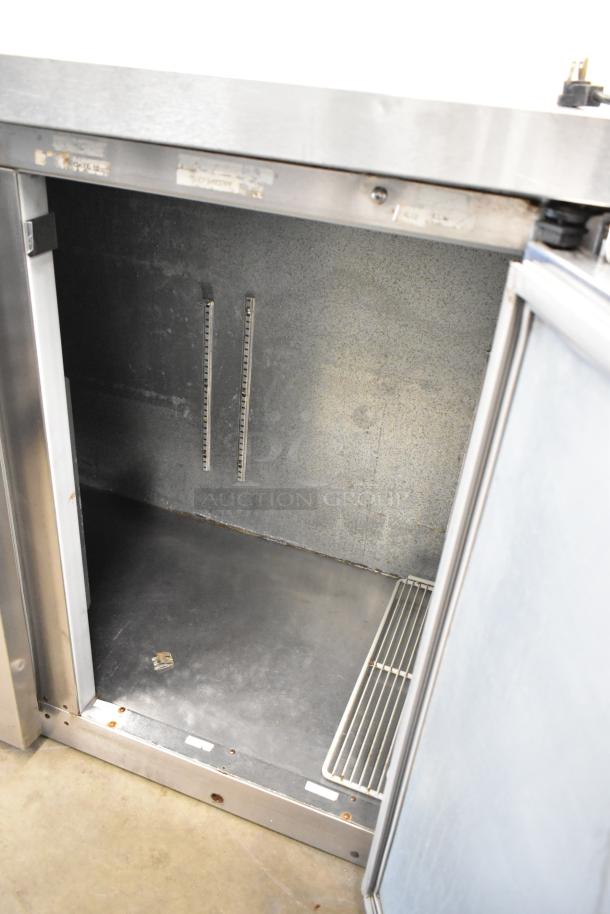 Beverage Air BB72 stainless steel commercial 3-door undercounter cooler interior; 115 volts, 1 phase. Clean, durable design.