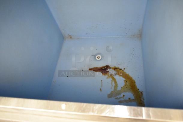 Manitowoc RFS0300A commercial ice head on bin. Stainless steel. Interior shows stains and residue. 115 volts, 1 phase.