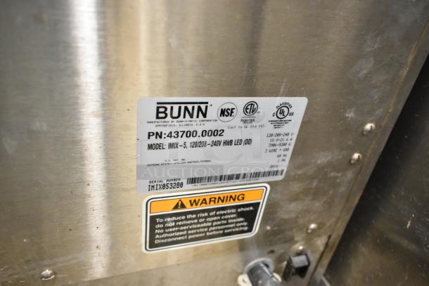 Bunn IMIX-5 stainless steel cappuccino machine label with model, voltage details, and safety warning.