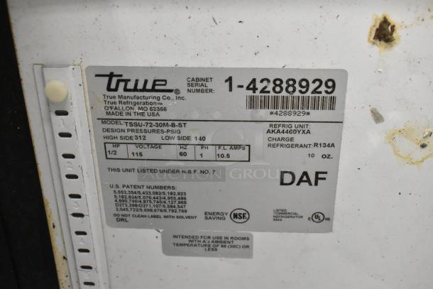 True TSSU-72-30M-B-ST stainless steel prep table label, showing model, serial number, voltage, refrigerant details. Missing lid.