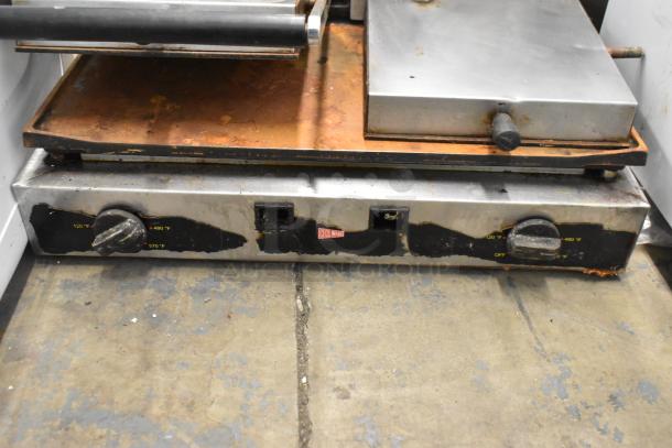 Cecilware stainless steel double panini press, commercial countertop model, 208 volts, 1 phase, visibly worn condition.