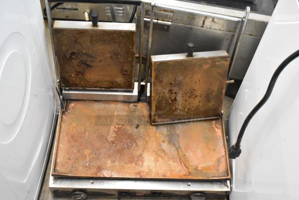 Cecilware stainless steel commercial double panini press, 208 volts, 1 phase, with visible wear on plates.