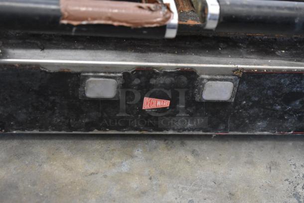 Cecilware stainless steel commercial countertop double panini press, 208 volts, 1 phase. Visible wear and Cecilware logo.