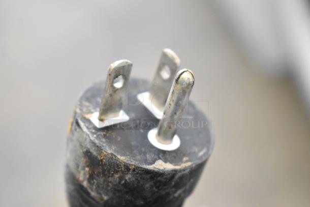 Plug of a Cecilware Stainless Steel Commercial Countertop Double Panini Press, showing wear. 208 Volts, 1 Phase.