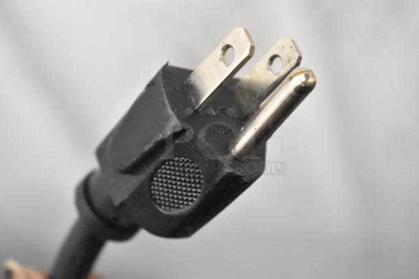 Hamilton Beach P90D23AL-WR microwave plug; black, standard two-prong, signifying 120V, 1 Phase power.