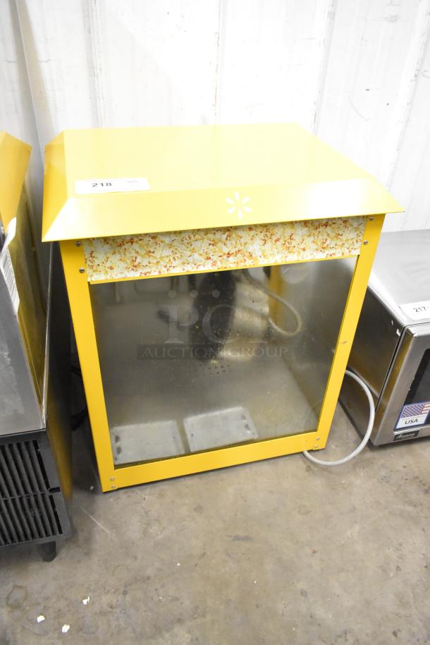 2019 OY-828 metal popcorn machine and merchandiser, yellow finish, 110 volts, 1 phase, branded with popcorn graphics.